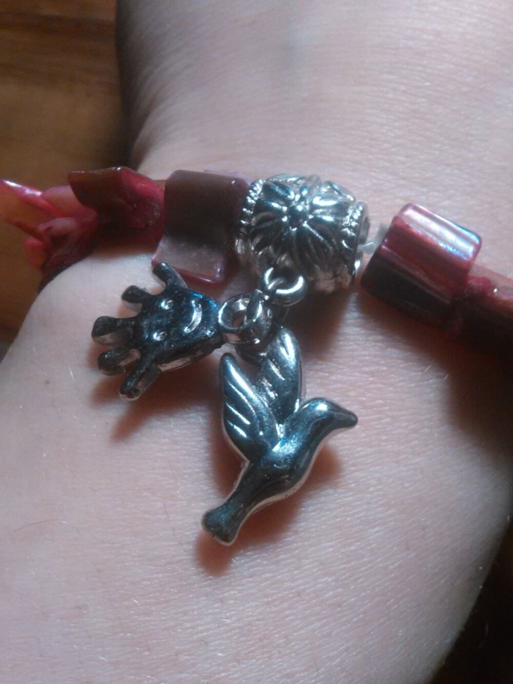 Dove and Smiley Hand Charm Pink Shell Stretch Bracelet